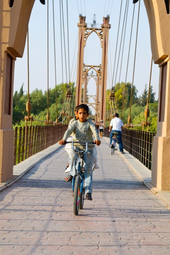 Syrian children-bicycle-Euphrates River-Deir ez-Zor-bridge