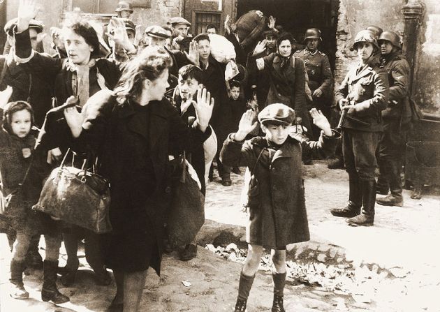 The Warsaw Ghetto was a closed ghetto.  In May 1943, the Nazis attempted to liquidate it, sending many to the deaths in labor and concentration camps.  Individual Jews escaped, however, and continued to hide in the ruins.