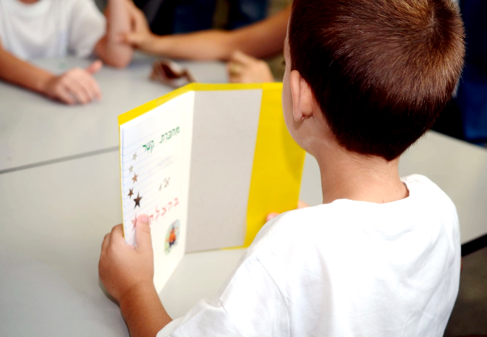 Back to school-a first-grader waiting for his first lesson on the first day of school