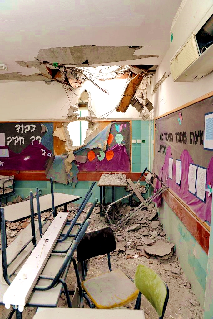 An Israeli kindergarten in Beersheva is struck by a Hamas missile.