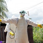 Health care workers suit up in protective gear to prevent the spread of Ebola