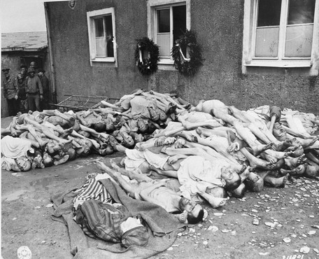 The bodies of former prisoners are stacked outside the crematorium in the newly liberated Buchenwald concentration camp.