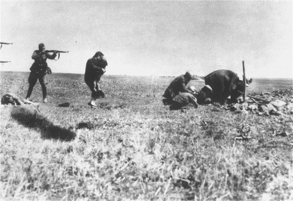 Executions of Jews by German army mobile killing units (Einsatzgruppen) near Ivangorod Ukraine. The above photo was mailed from the Eastern Front to Germany and intercepted at a Warsaw post office by a member of the Polish resistance collecting documentation on Nazi war crimes.