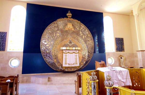 The Aron Kodesh (Torah Ark), which is today a comparative to the Ark of the Covenant, hangs above the bimah (platform) of the Geulat Moshe Synagogue in Tel Aviv, Israel.