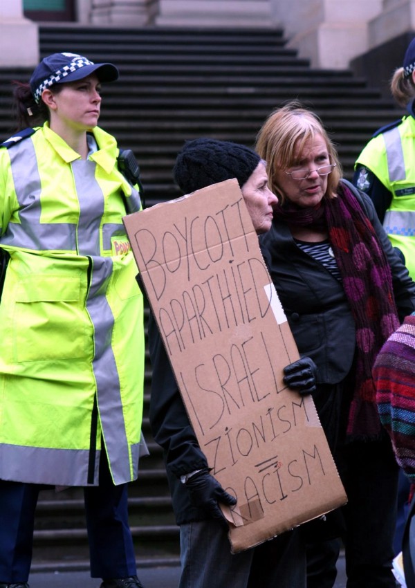 BDS protesters in Melbourne erringly equate Zionism with racism.