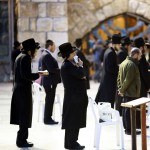 Jewish men pray at the Western (Wailing) Wall in Jerusalem.