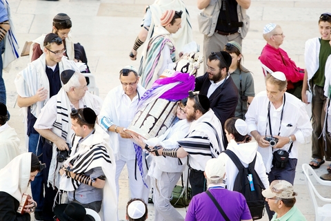 Carrying the Torah at the Western (Wailing) Wall in Jerusalem.