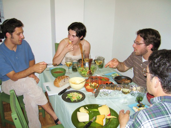 Friends gather to enjoy a kosher feast. (Photo by Sam Felder)