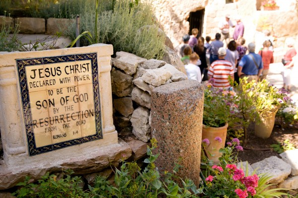 Pilgrims visit the Garden Tomb in Jerusalem.  Many believe this is the garden and sepulcher of Joseph of Arimathea, and therefore a possible site of the resurrection of Yeshua.  (Israel Tourism photo)