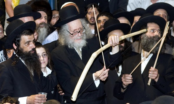 Rabbi Eliezer Berland shoots arrows with a bow near Bar Yochai's tomb in Meron, Israel during Lag BaOmer. Archery is a Lag BaOmer custom that, to some, represents Bar Yochai’s words which were shot like arrows, bringing repentance to the unholy.