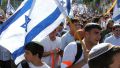 Israelis carry flags through the streets of Jerusalem.