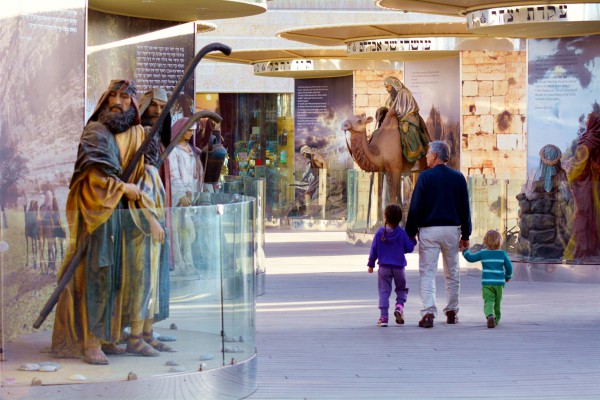 A father brings his children through the Bible City exhibits at Cinema City in Jerusalem. Within this particular set of exhibits are 62 stories from the Bible, including the creation of the world, the binding of Isaac, Jacob’s ladder, and the biggest Noah's Ark exhibit of its kind in the world.