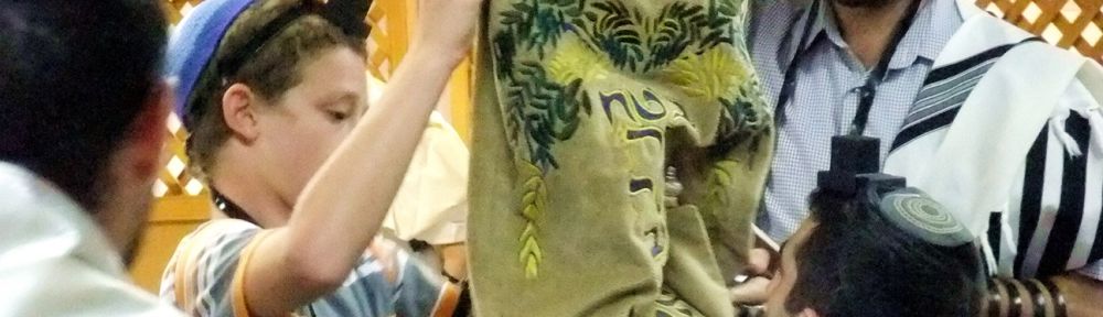 If the Torah scroll is not housed in a Torah tik (case), after the Torah reading, the Golel (roller) performs Gelila (rolling up). The Torah is then bound with a sash and covered with the Torah cover. The honor of being the Golel is sometimes given to a child under Bar Mitzvah age.