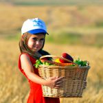 Shavuot-Israeli-child-fruit-vegetables-basket