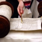 Torah scroll and yad (Torah pointer, literally, hand)