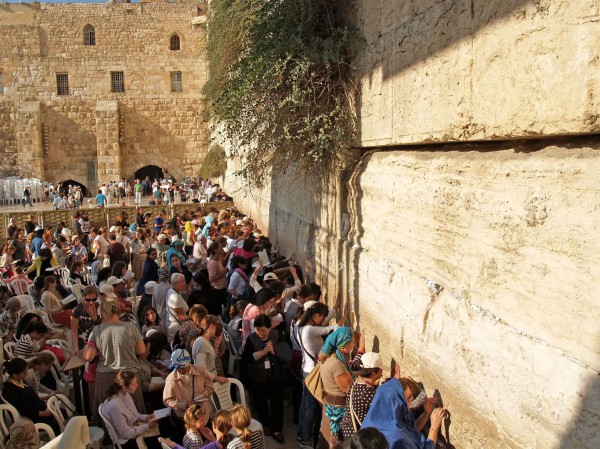 Women pray at the Women's Section of the Western (Wailing) Wall.