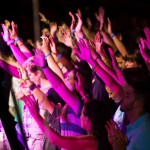 Jewish and Arab Believers raise their hands to worship the God of Israel together at the Elav Conference.