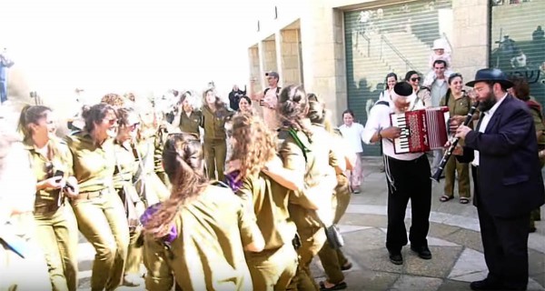 Soldiers dance in Jerusalem.  