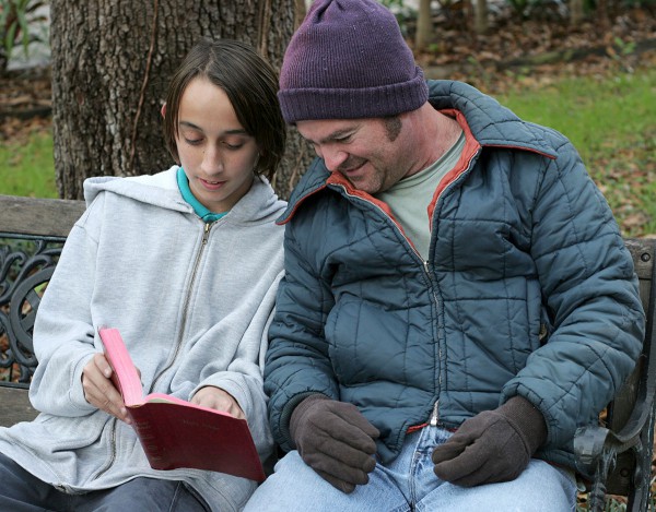 Teen shares the Word of God with a homeless man
