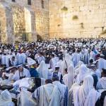 Jewish men gather at the Western (Wailing) Wall for prayer.