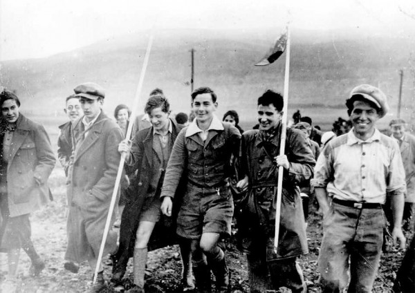 Youth making Aliyah from Germany, marching toward Kibbutz Ein Harod in the Jezreel Valley of northern Israel on February 16, 1934.